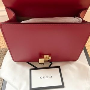 Gucci Small Red leather Sylvie shoulder bag  w ribbon and gold hardware. New.